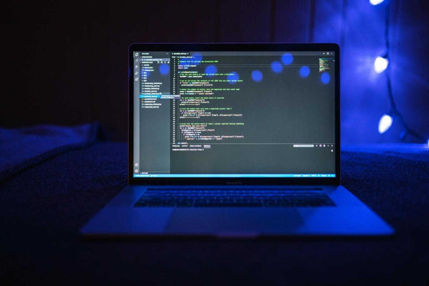 Mobile game development workspace with multiple device testing setup